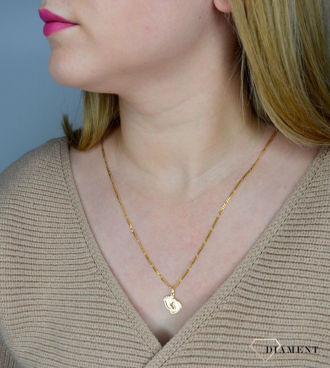 Złota zawieszka stópki DIA-ZAW-0125-585.jpg